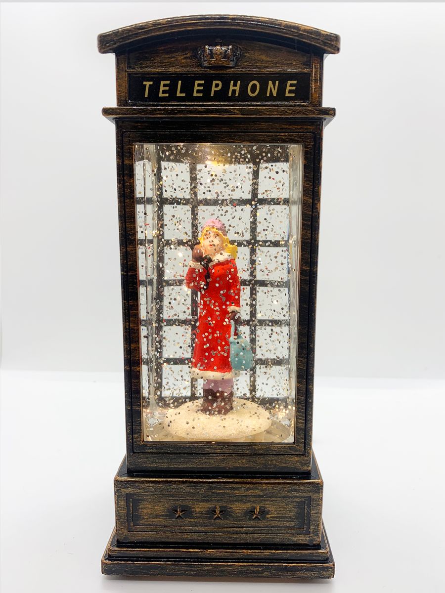 Klassisk telefonkiosk med glitter og ledlys