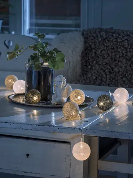 Hovedbilde Slynge med sorte og hvite baller